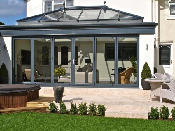 Dark Grey Aluminium Bifold Doors on a conservatory in Carmarthen